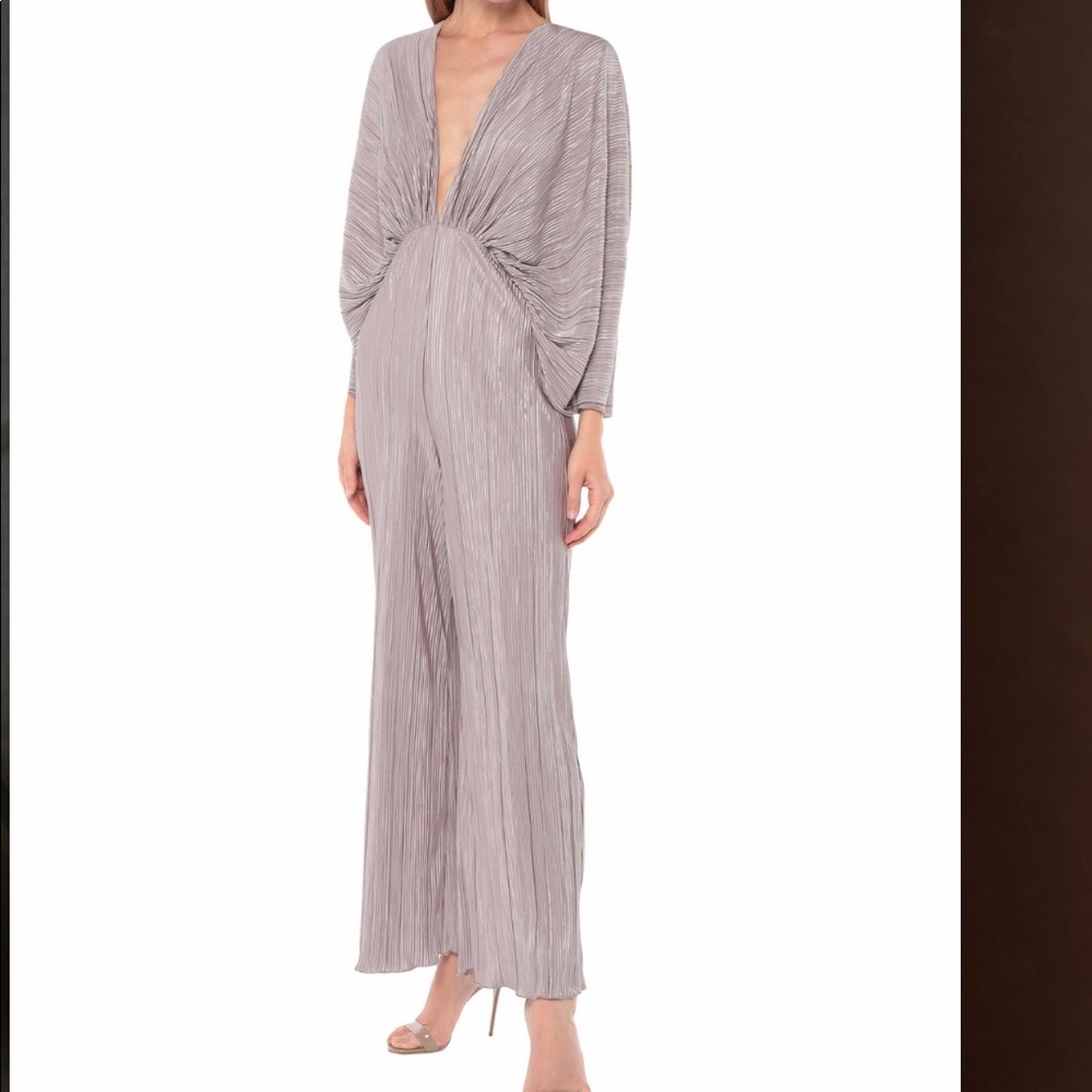 Brand new Rotate jumpsuit in silver.